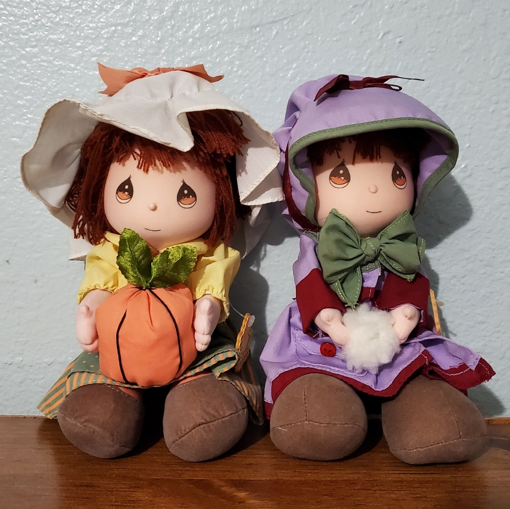 Two Precious Moments Dolls of the Month Otober & January. Excellent condition.